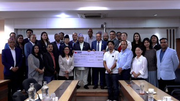 एनआरएनएद्वारा प्रधानमन्त्री दैवी प्रकोप उद्धार कोषमा एक करोड हस्तान्तरण